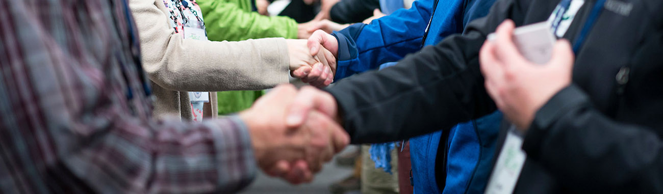 Shaking hands at the ATIA Convention